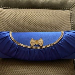 Best offer accepted Blue clutch with silver accent bearing